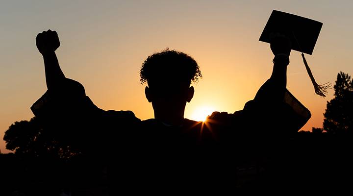 Sunset silhouette of a WSC graduate