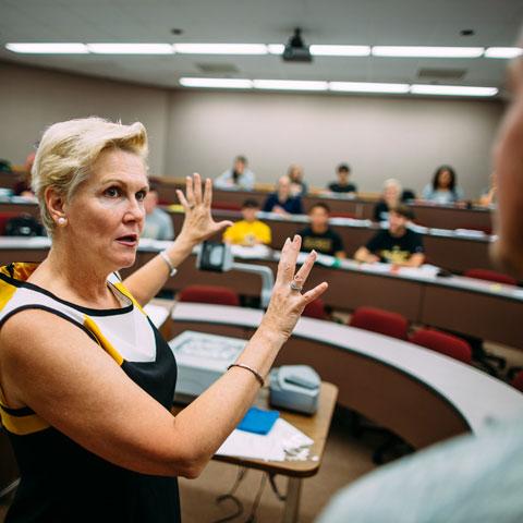 A business professor gives instruction at WSC