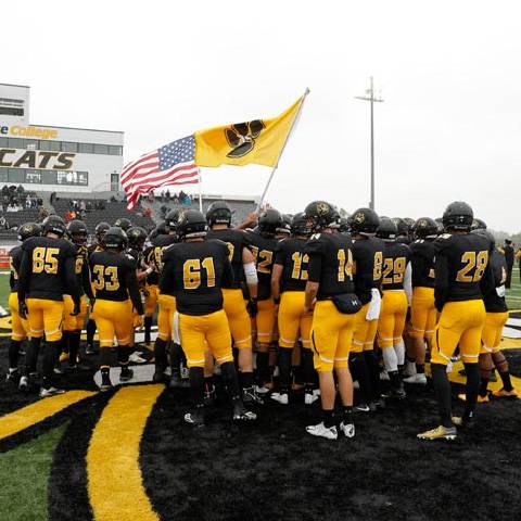 Football team during Homecoming game