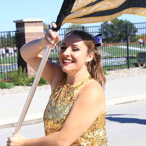 WSC student flag bearer at Homecoming