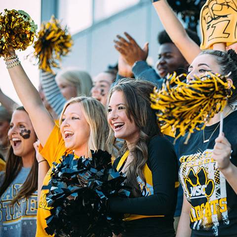 Students cheering at WSC football game