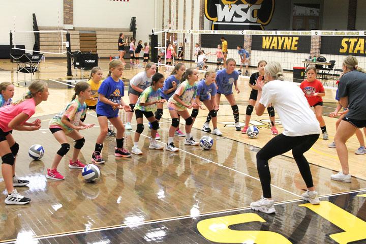 Young athletes participate in a WSC volleyball camp.