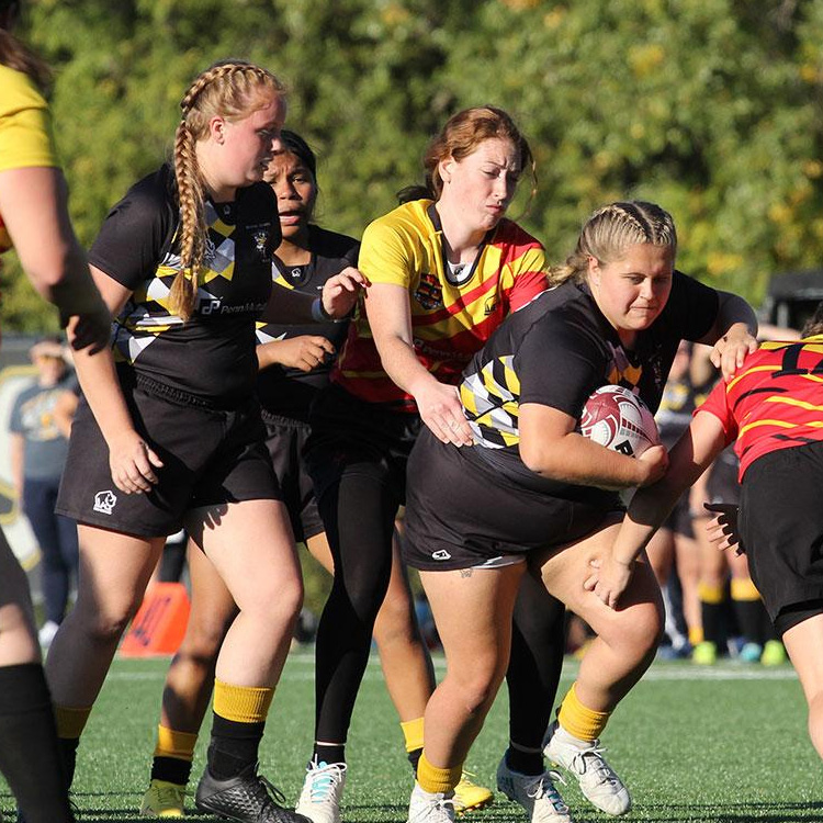 Students playing rugby