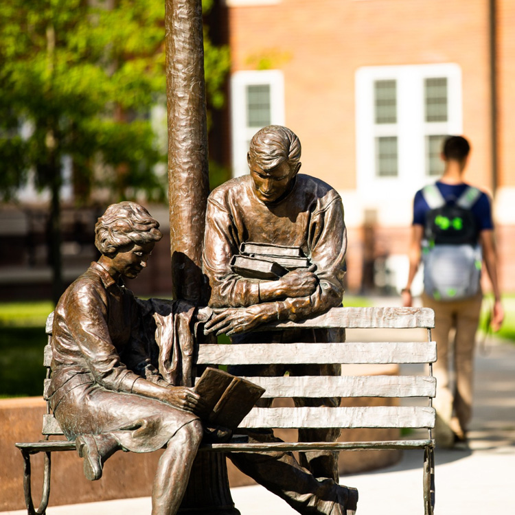 Bronze statues outside of Conn Library