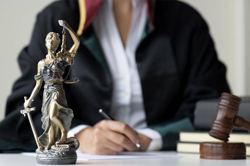 Criminal Justice master's degree concept with scales of justice