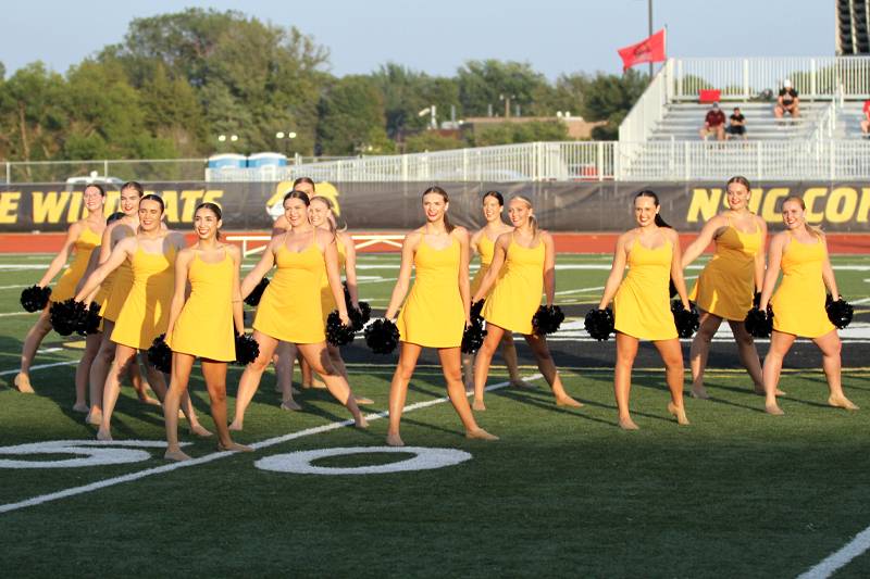 The WSC Dance Team performs at half-time during a home football game