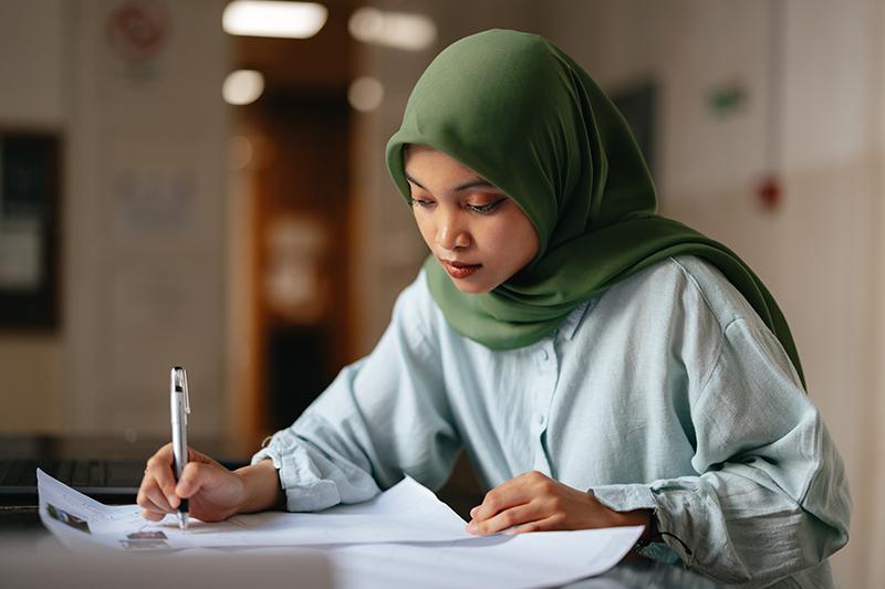 Muslim student studying