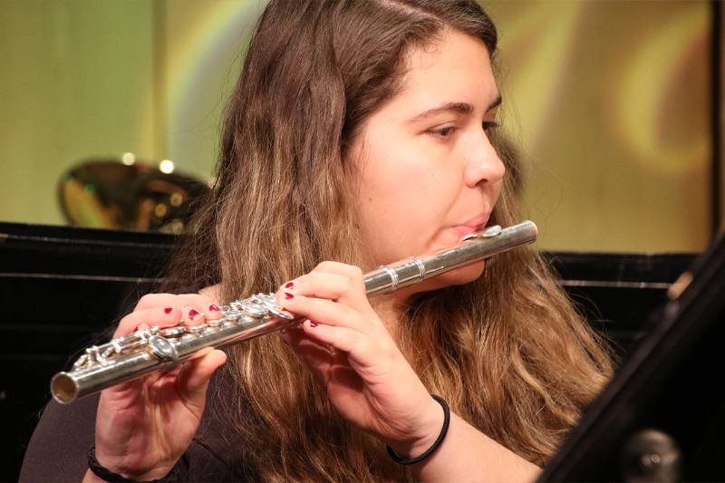 A student performs in the Wind Ensemble concert