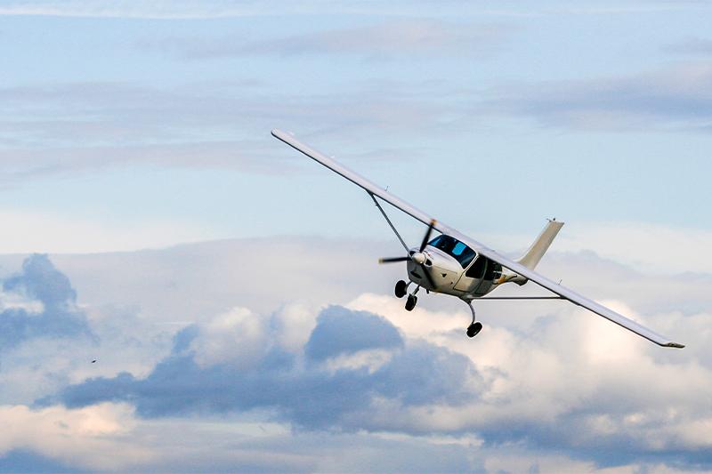 Photo of a small plane flying