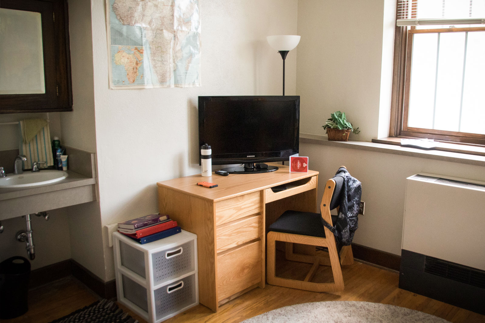 Rooms in Neihardt include a sink and medicine cabinet