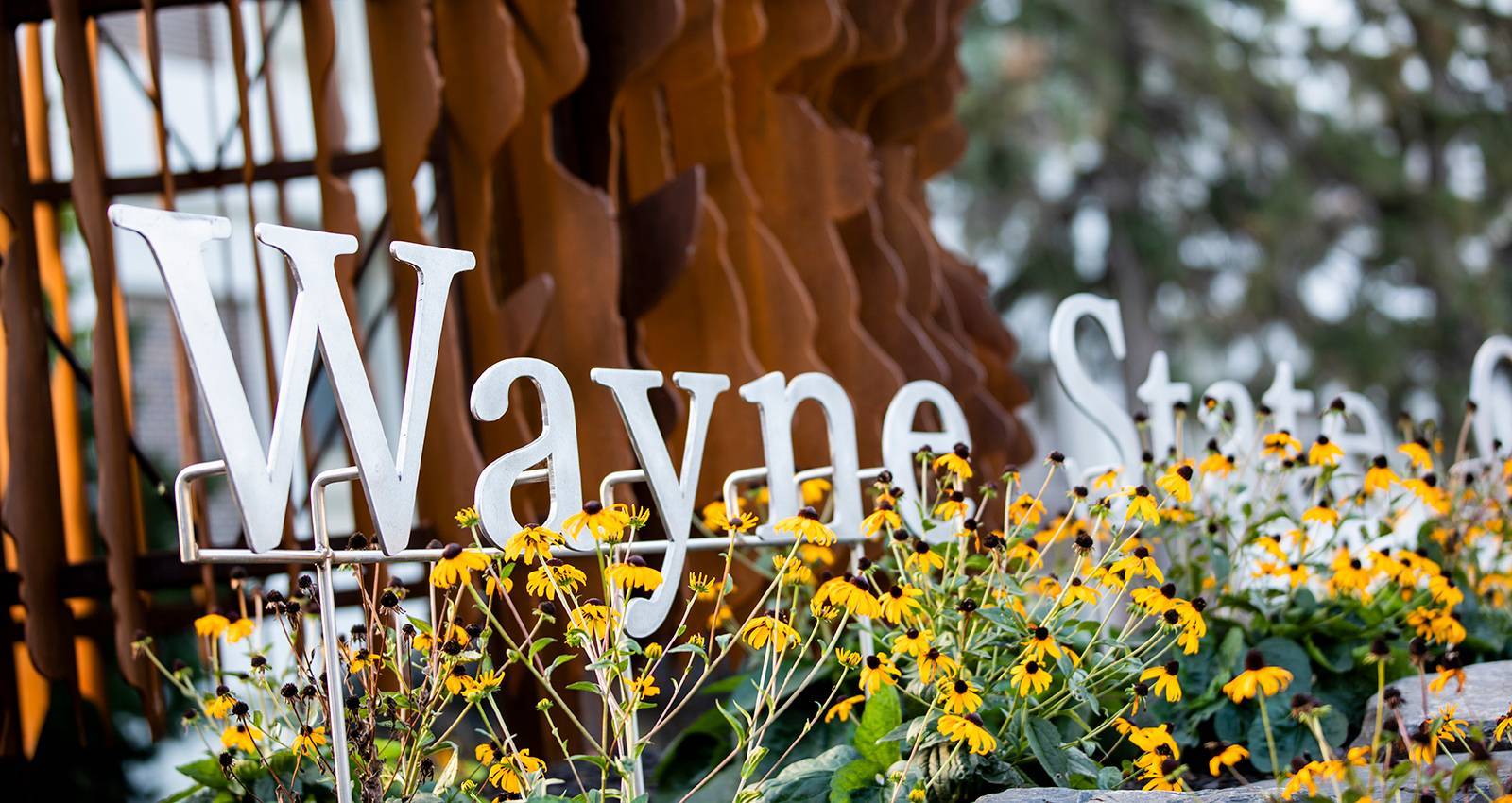 Wayne State College surrounded by flowers