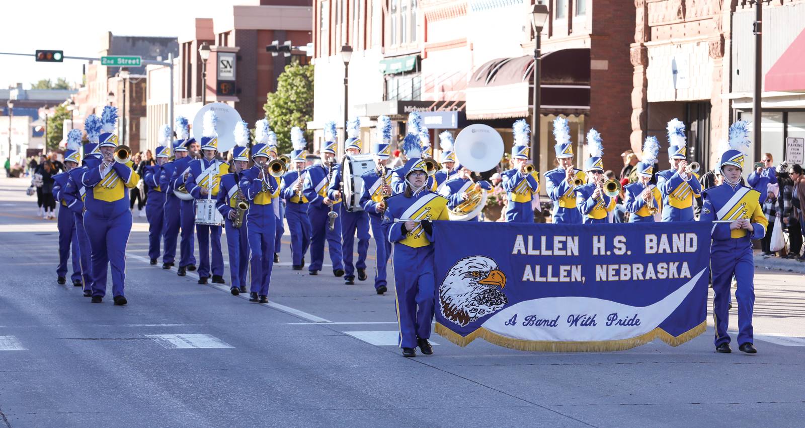 The Allen High School Marching Band marches through downtown Wayne.