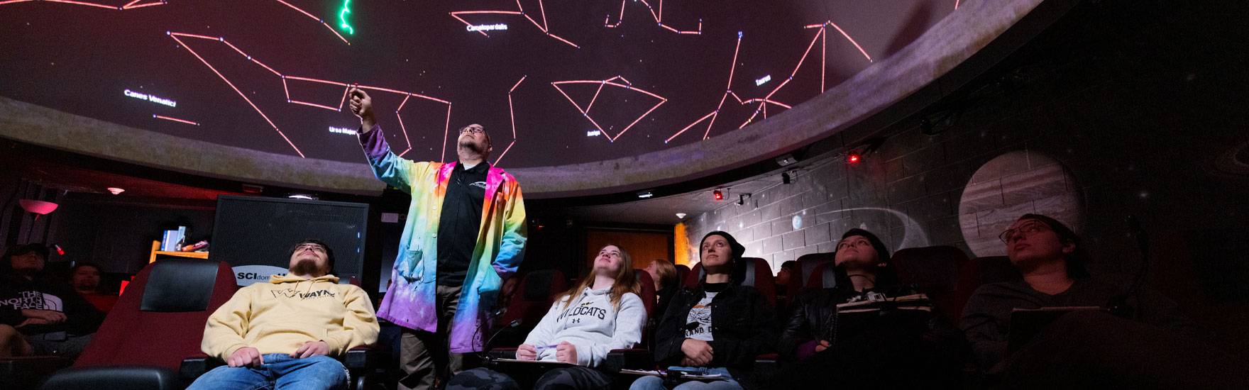 Dr. Todd Young leads a lesson in the Planetarium