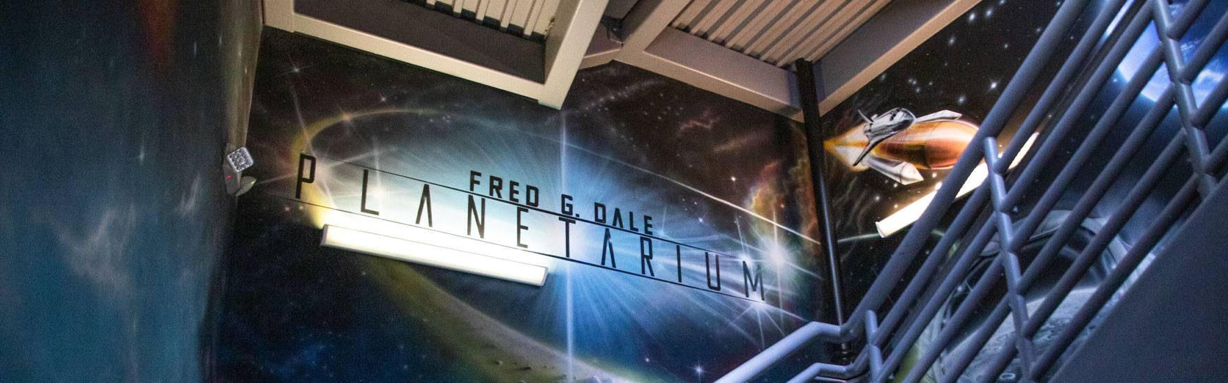 Painted mural on the stairwell to the Planetarium