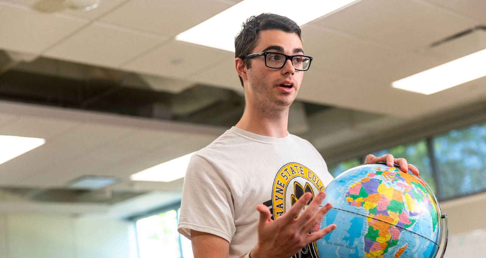 A WSC student prepares for a geography lecture.