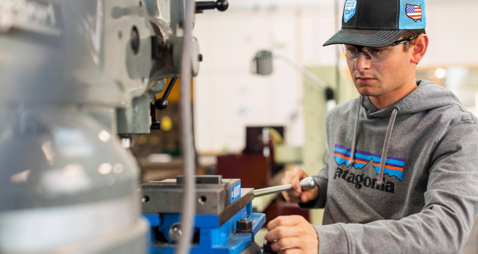 A student in the Industrial Technology program works in a lab