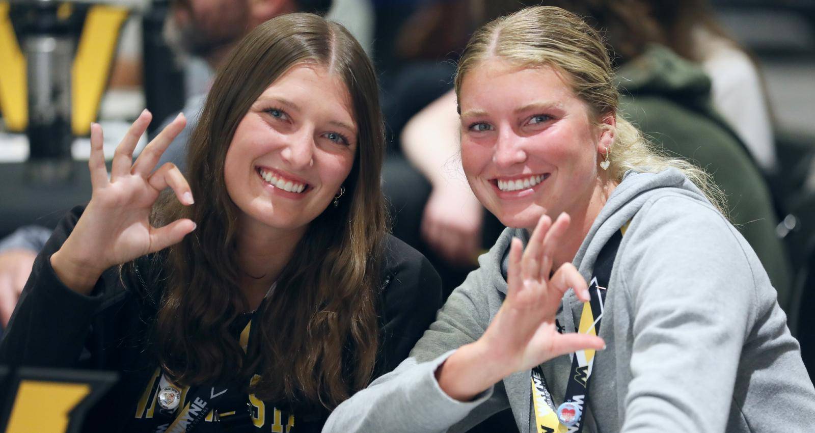 Smiling students at an NSR event
