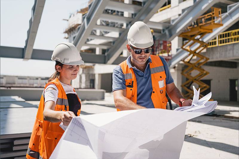 Civil engineers work on a construction site