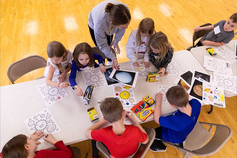 Early childhood education students work with young children in Wayne