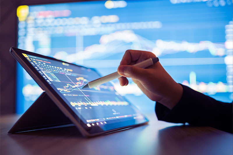 Economics degree concept featuring stock trader