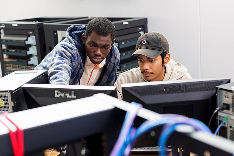 Technology support degree concept featuring IT repair technician students at WSC