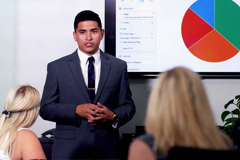 A WSC business management degree student gives a presentation