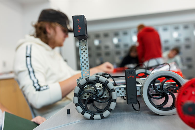 Mechanical engineering degree concept featuring students in the robotics lab at WSC