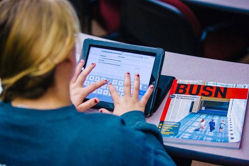 A student works on an iPad