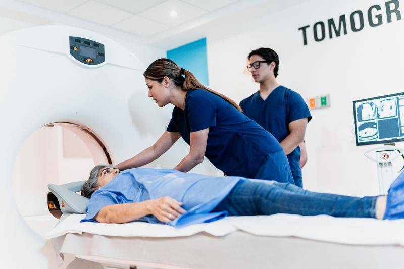 A Radiography student works with an MRI machine