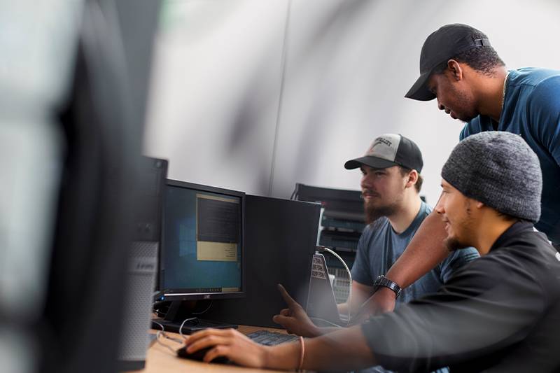 Computer programming students work in a PC lab at WSC