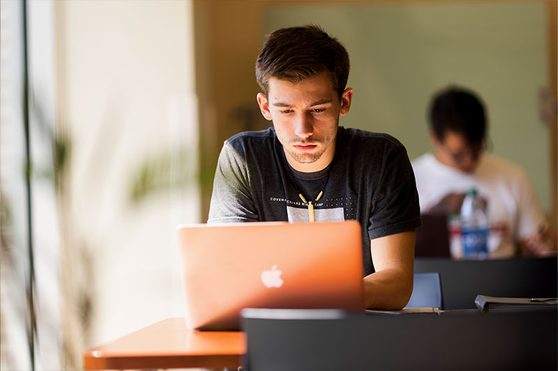 Psychology education degree concept featuring a student studying at the WSC library