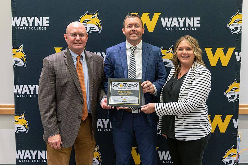 Midwest Bank receives the 2021-22 Employer of the Year Cooperative Education Award (Doug Johnson, Jason Love, and Amy Schroeter)