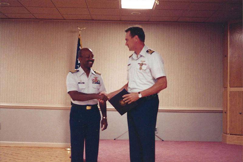 Curt Ott '77 receives an award