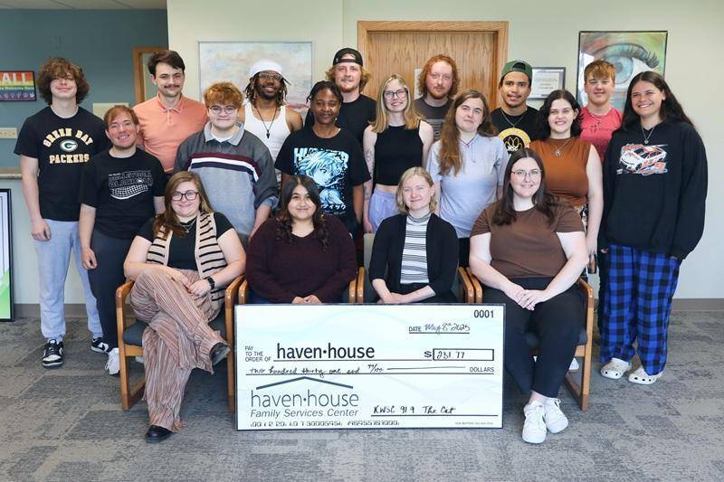 KWSC presents a check to Haven House in Wayne