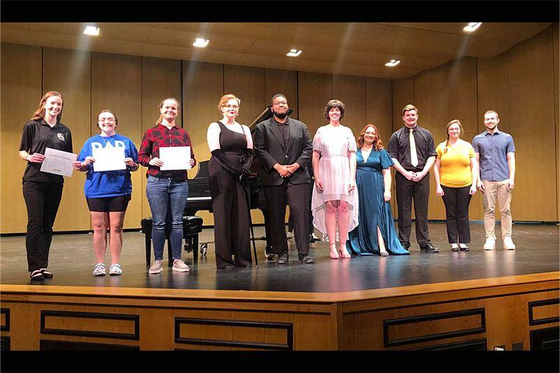 Photo of students participating in the honors recital