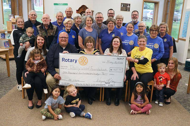 Photo of Wayne Rotary Club presenting a check for the Imagination Library fundraising launch party