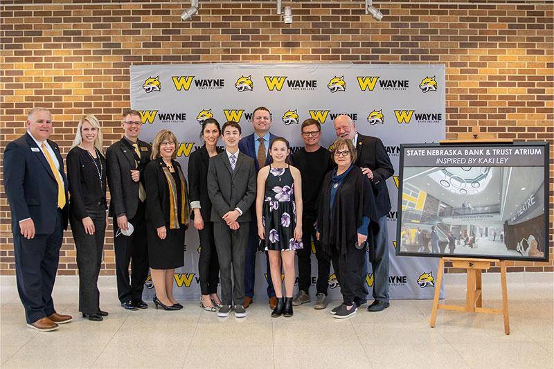 Representives from Wayne State College and the Ley Family join for a group picture