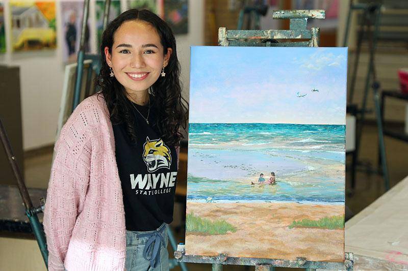 Lis Gonzalez and her painting "Guagua enel Agua (Baby in the Water)"