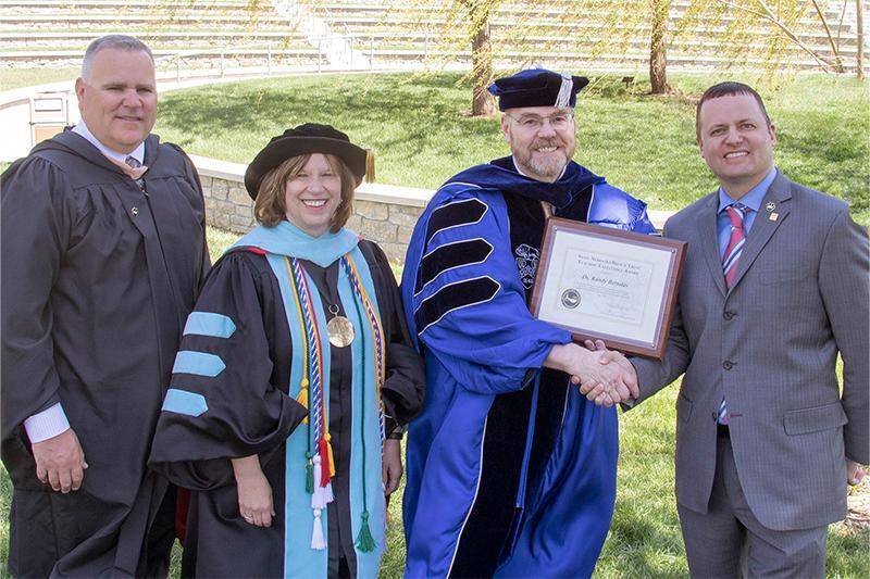 Dr. Randy Bertolas, second from right, received the State Nebraska Teaching Excellence Award in 2018.
