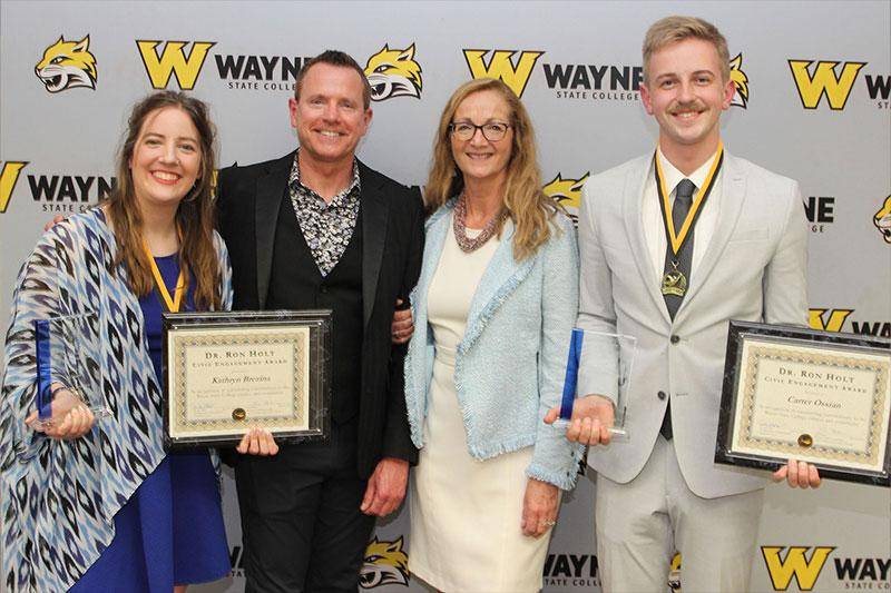 Photo of student recipients of the Ron Holt Civic Engagement Award, with Ron Holt and Lisa Nelson