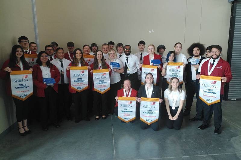 Student receiving awards at the 2024 Nebraska State SkillsUSA Competition