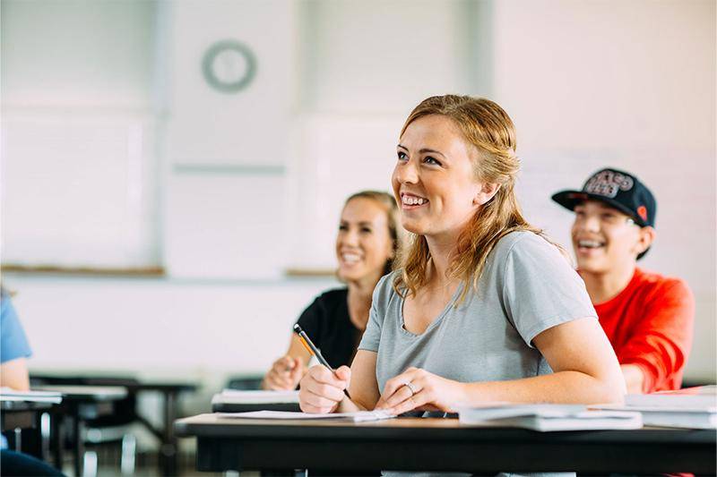 A female student sits in a classroom