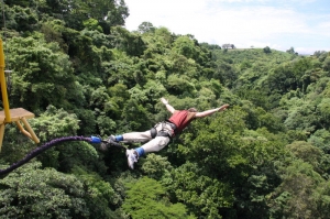 A student bungee jumps in Costa Rica