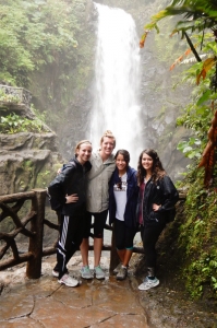 A group of students pose in front of La Paz waterfall in Costa Rica